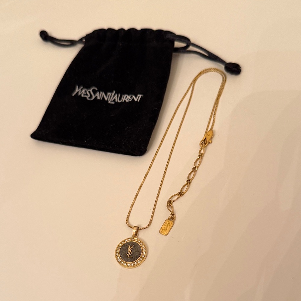Yves Saint Laurent Gold Necklace with Black Pendant
